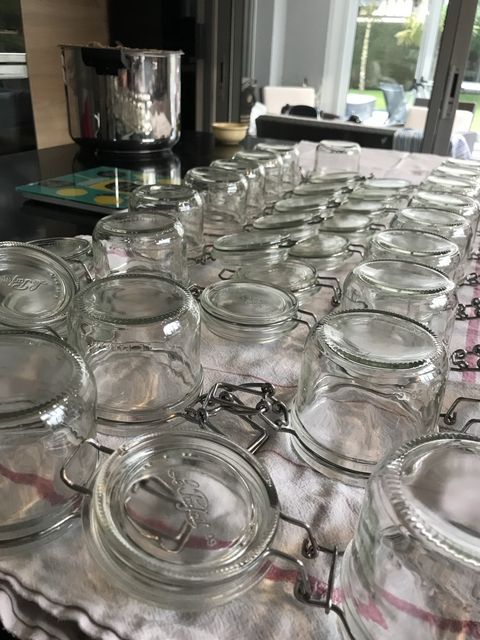 Jars drying upside-down on a towel