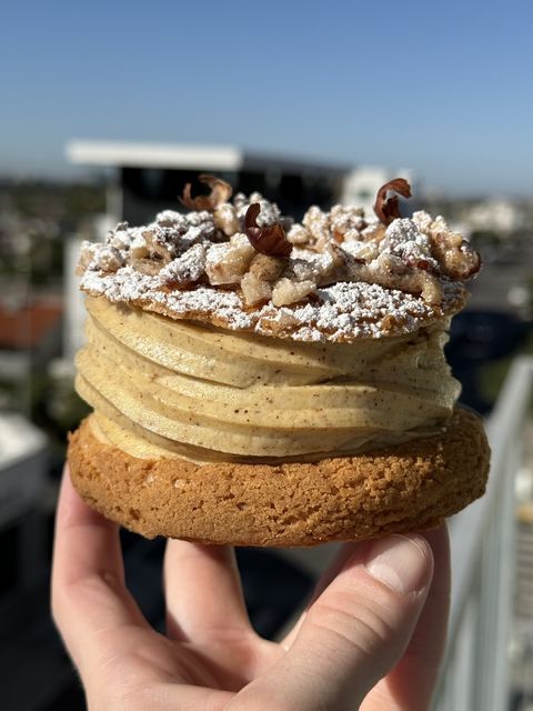 Individual Paris-Brest — choux ring with piped praline mousseline, hazelnuts and icing sugar
