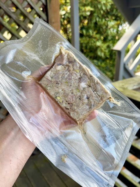 A slice of terrine vacuum-sealed, ready for the freezer