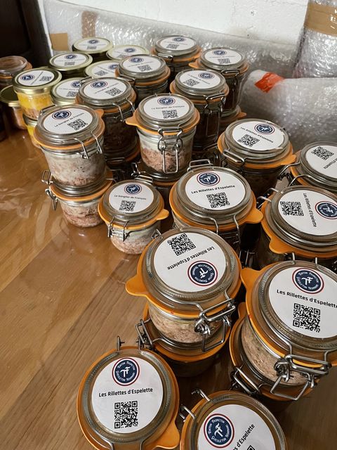 Finished jars with branded labels and QR codes